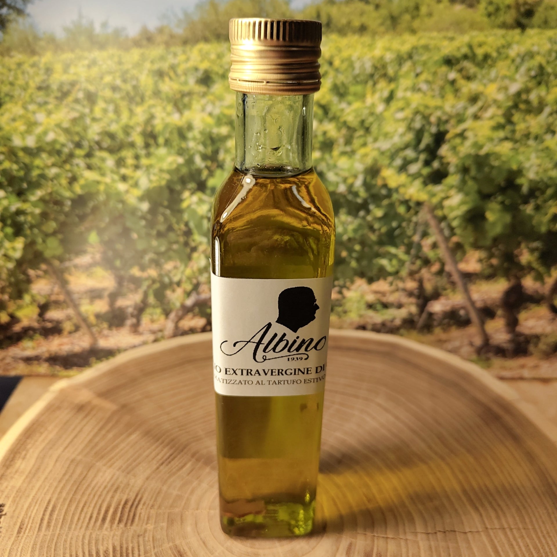 Olio Extra Vergine di oliva al tartufo estivo in bottiglia da 250ml.